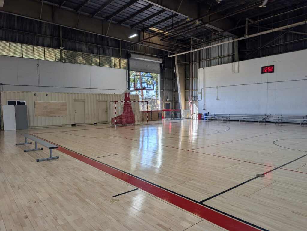 Far end of the wood courts with benches